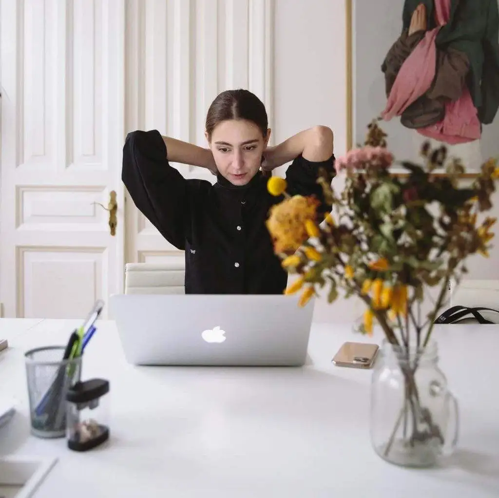 Woman at a computer working remotely